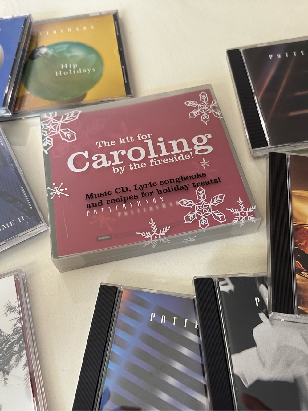 Pottery Barn caroling kit, holiday music and dinner/party CDs